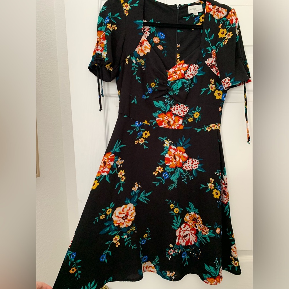 Bebop aline skater dress. Crepe polyester. spandex lining layer on lower half